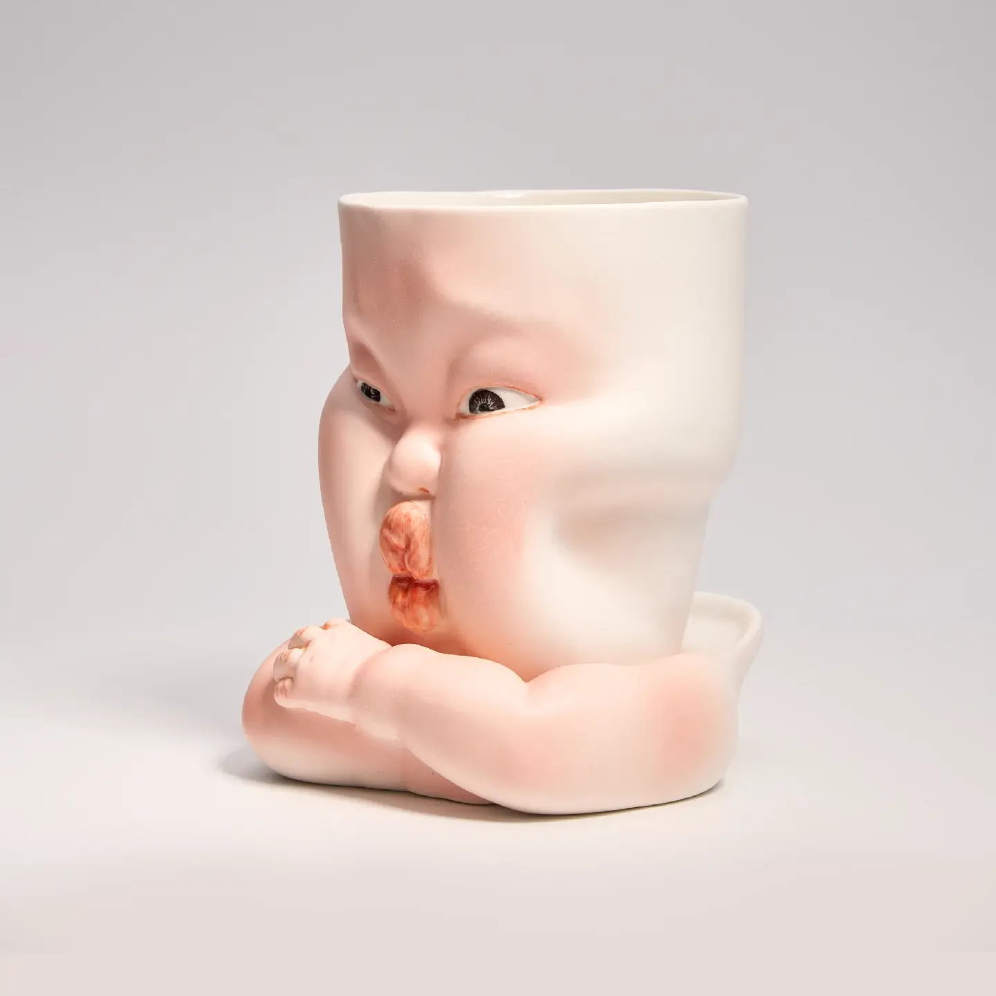 Whimsical Ceramic Cheeky Pinch Mug-Unique & Thoughtful Gifts for Meaningful Moments Whimsical Ceramic Cheeky Pinch Mug-this hand-painted mug features a chubby cheek being pinched in a gesture of affection