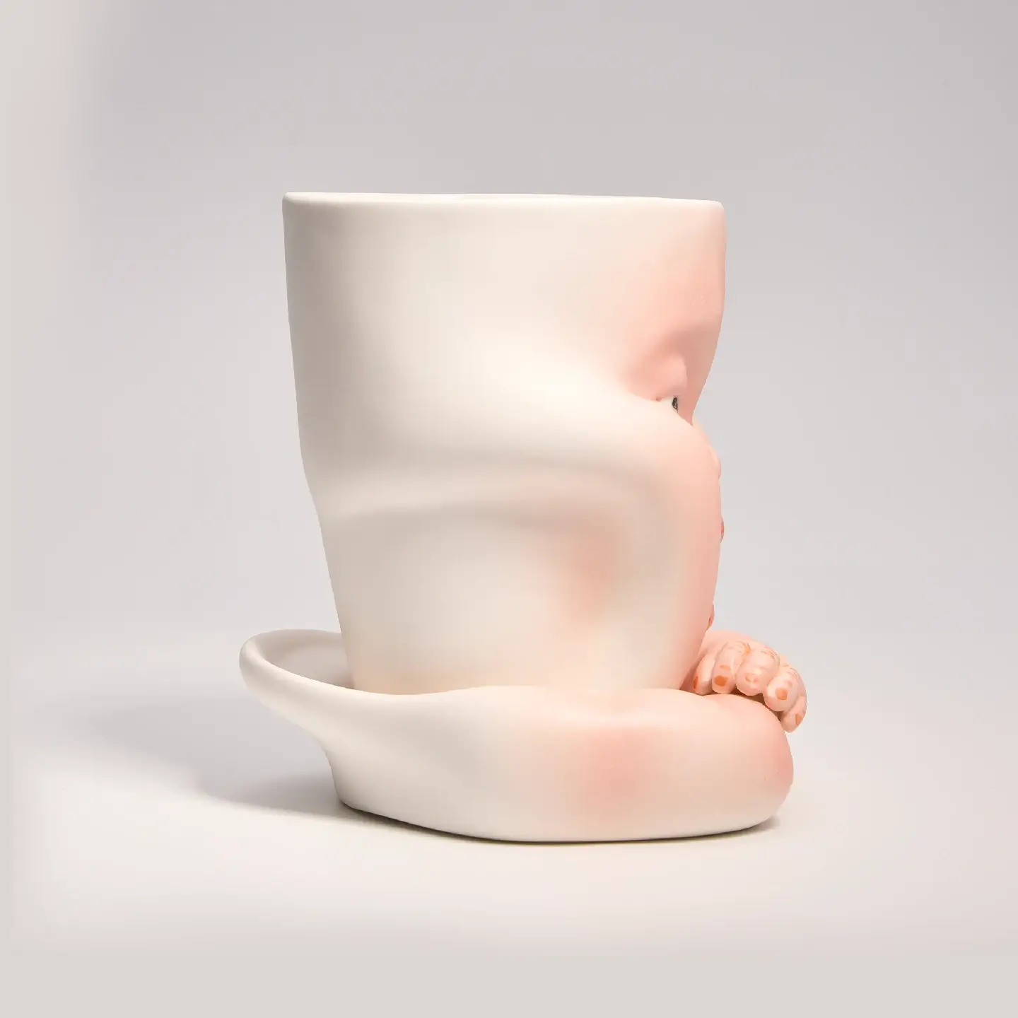Whimsical Ceramic Cheeky Pinch Mug-Unique & Thoughtful Gifts for Meaningful Moments Whimsical Ceramic Cheeky Pinch Mug-this hand-painted mug features a chubby cheek being pinched in a gesture of affection