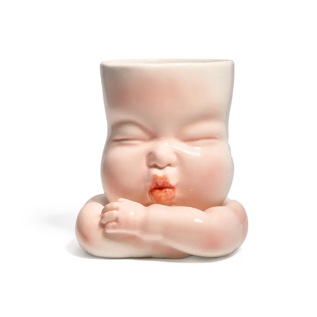Whimsical Ceramic Smooch Mug-this hand-painted mug features a cute puckered face ready for a shy kiss.