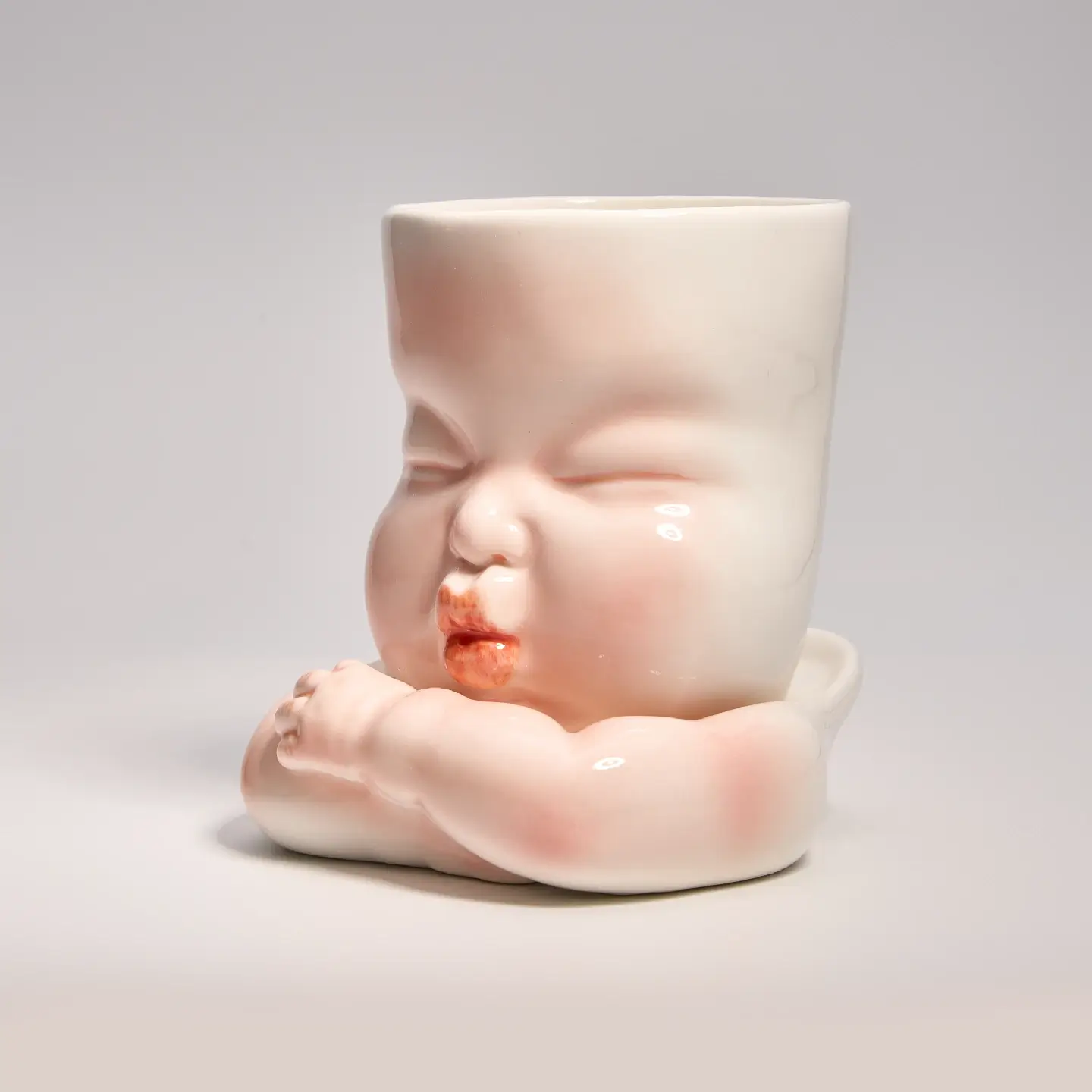Whimsical Ceramic Smooch Mug-Unique & Thoughtful Gifts for Meaningful Moments Whimsical Ceramic Smooch Mug-this hand-painted mug features a cute puckered face ready for a shy kiss.