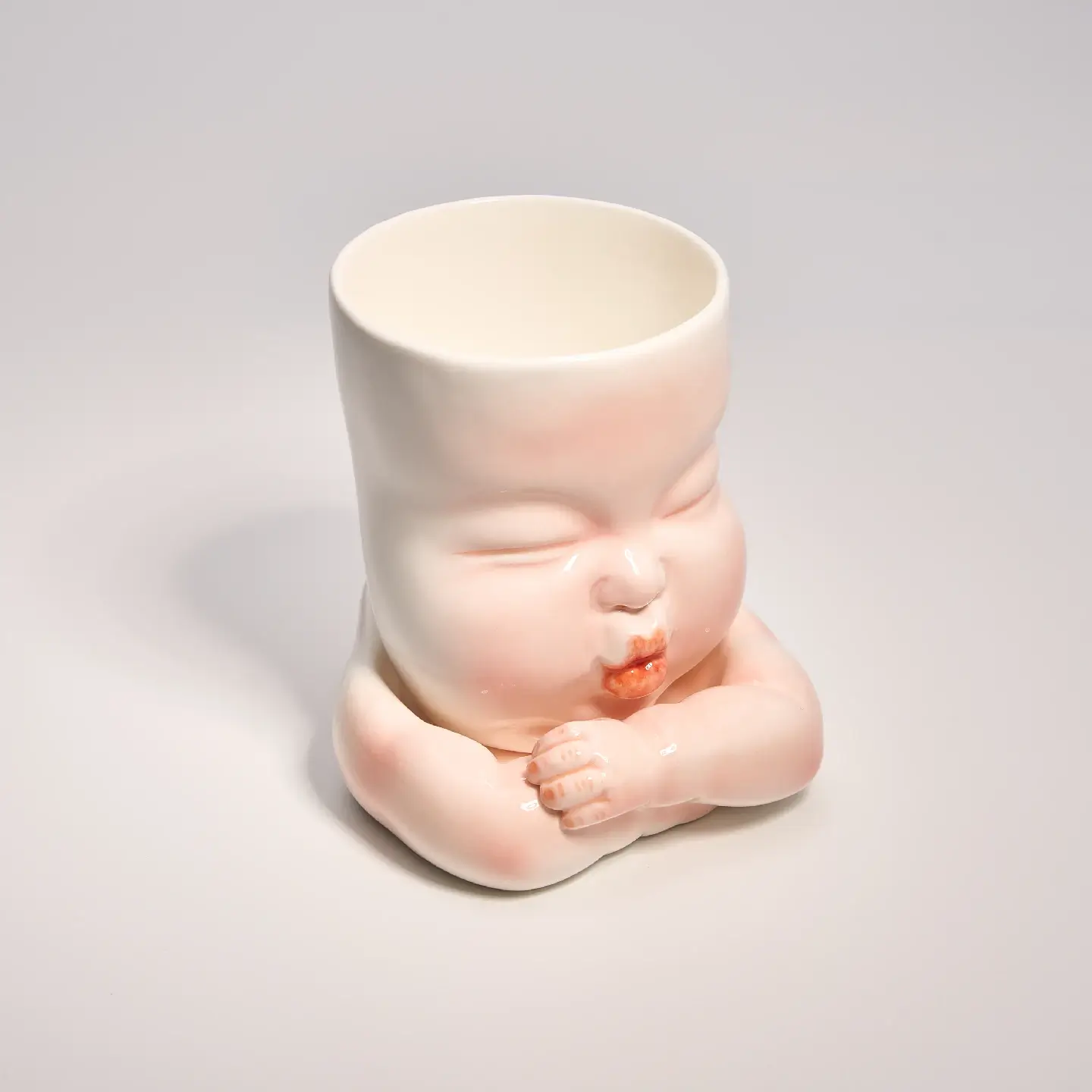 Whimsical Ceramic Smooch Mug-Unique & Thoughtful Gifts for Meaningful Moments Whimsical Ceramic Smooch Mug-this hand-painted mug features a cute puckered face ready for a shy kiss.