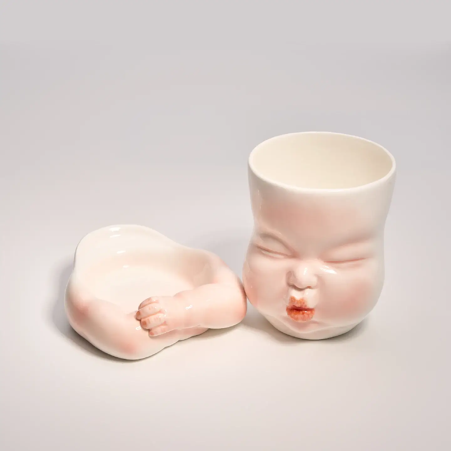 Whimsical Ceramic Smooch Mug-Unique & Thoughtful Gifts for Meaningful Moments Whimsical Ceramic Smooch Mug-this hand-painted mug features a cute puckered face ready for a shy kiss.