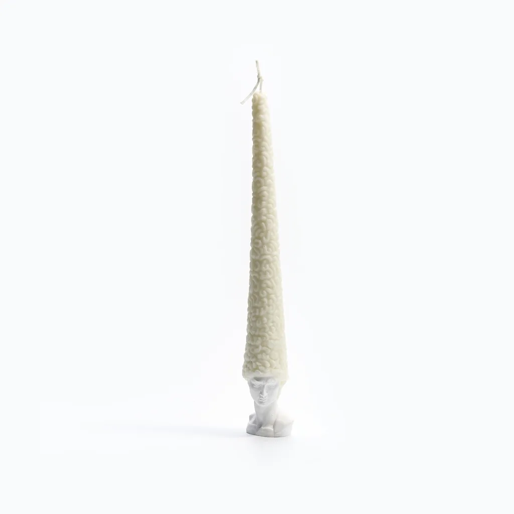 Bald David Bust Scented Candle–The scented candle's wax 'hair' slowly melts away as it burns