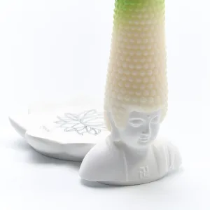 Whimsical Buddha Head Scented Candle-Featuring an exaggerated wax "hair" that extends from a joyful Buddha base.