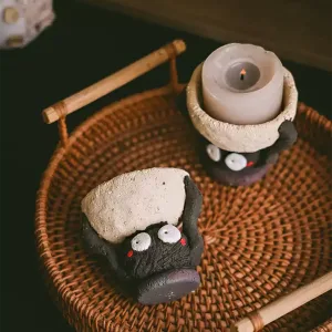 Ceramic Soot Sprite Candle Holder-Handcrafted from coarse pottery to capture the texture of a hardworking spirit.