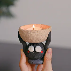 Ceramic Soot Sprite Candle Holder-Handcrafted from coarse pottery to capture the texture of a hardworking spirit.