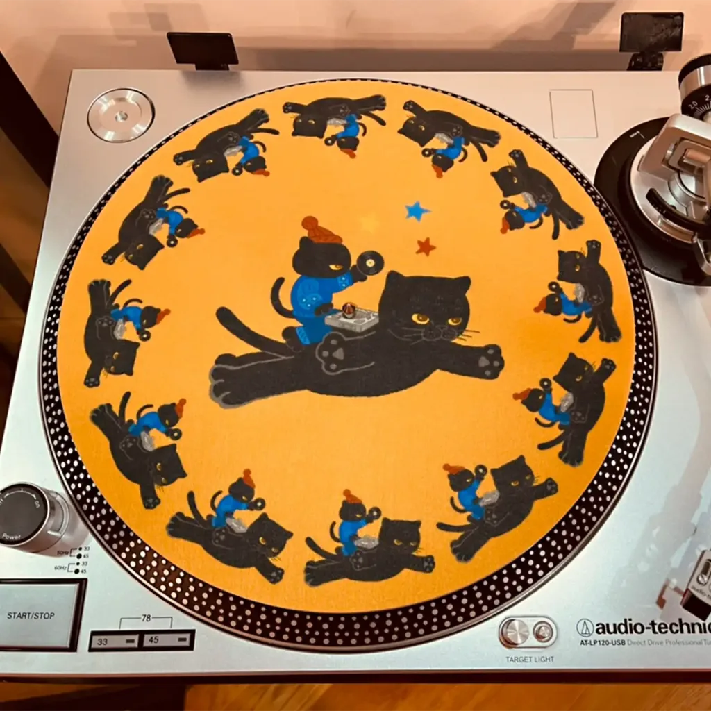 Retro DJ Cat Vinyl Slipmat-this feline spins hypnotically along with your favorite tracks