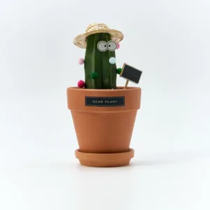 Friendly Cactus Desk Plant-Bring a smile and good fortune to any space with this whimsical cactus planter.