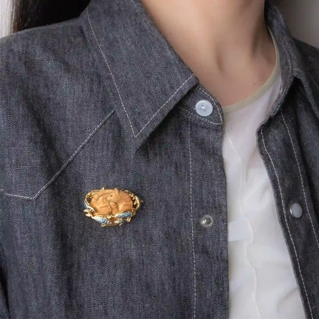 Saturn Cat`s Dream Brooch-This beautifully made brooch captures a blissful cat dreaming of fish.