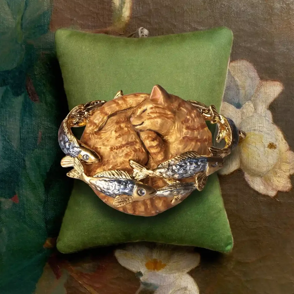 Saturn Cat`s Dream Brooch-This beautifully made brooch captures a blissful cat dreaming of fish.