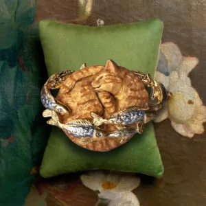 Saturn Cat`s Dream Brooch-This beautifully made brooch captures a blissful cat dreaming of fish.
