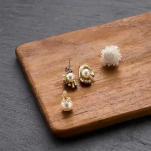Hand Pearl Drop Earrings-These beautifully made golden hand earrings cradle a swinging pearl
