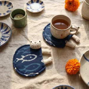 Tie-Dye Cat Coaster-This charming tie-dye cat coaster protects your surfaces with playful style.