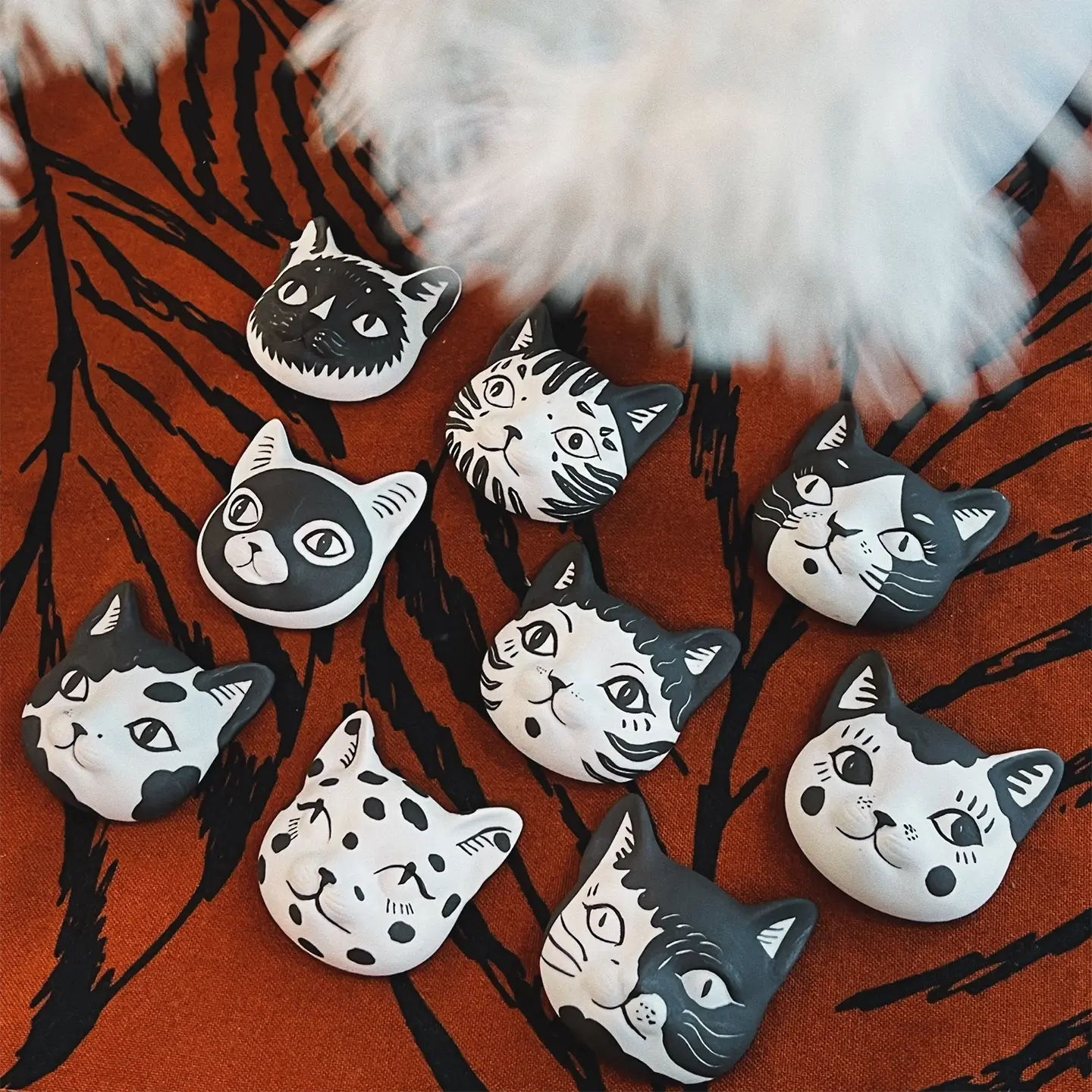 Cats Fridge Magnet-Unique & Thoughtful Gifts for Meaningful Moments Cats Fridge Magnet-Transform your kitchen into a feline sanctuary with these nine hand-painted ceramic magnets.